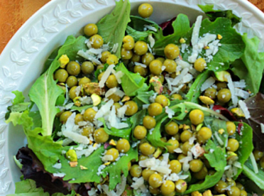 Warm Baby Green Salad with Peas, Pistachios and Pecorino