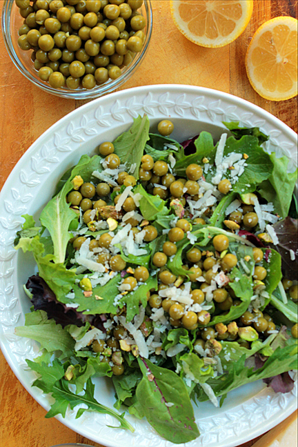 Warm Baby Green Salad with Peas, Pistachios and Pecorino