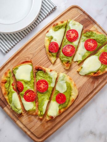 pea pesto flatbread recipe made with canned peas, tomatoes and fresh mozzarella cheese