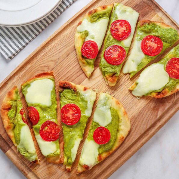 pea pesto flatbread recipe made with canned peas, tomatoes and fresh mozzarella cheese